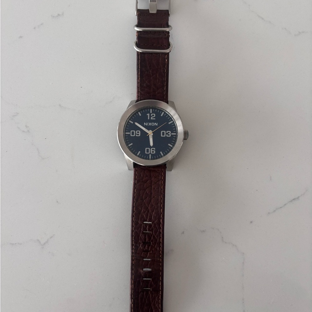 Nixon Watch with Blue Dial and Brown Leather Strap